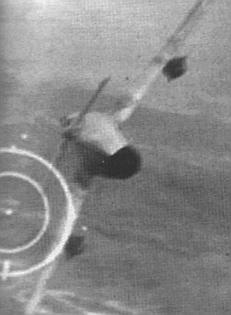 MiG in crosshairs. The MiG tactics were usually designed to effect a fast approach on a bomber group, preferably from below.