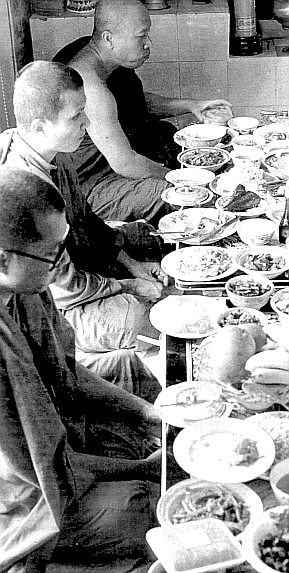 Monks chant at Precepts Day, when the faithful bring their sins for cleansing.