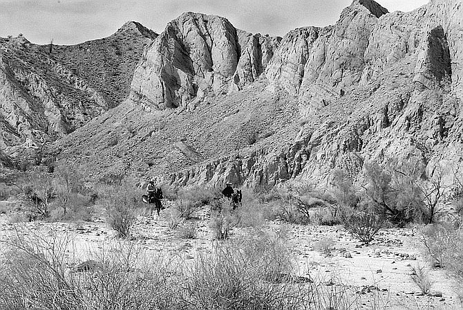 Canyon Sin Nombre. "We're going in there," Schad said excitedly, indicating an opening between two rock faces, and then we parked.