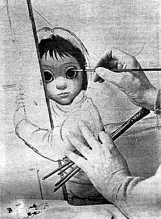 Keane's hands poised at painting. Margaret: "That was all a pose."