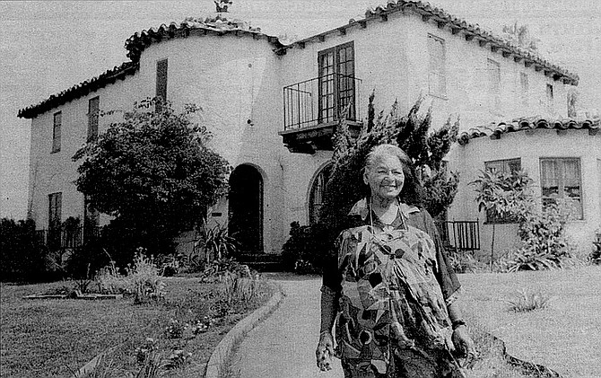 Miss Josie Moore: "You caught me in the kitchen cooking. Come in, come in."