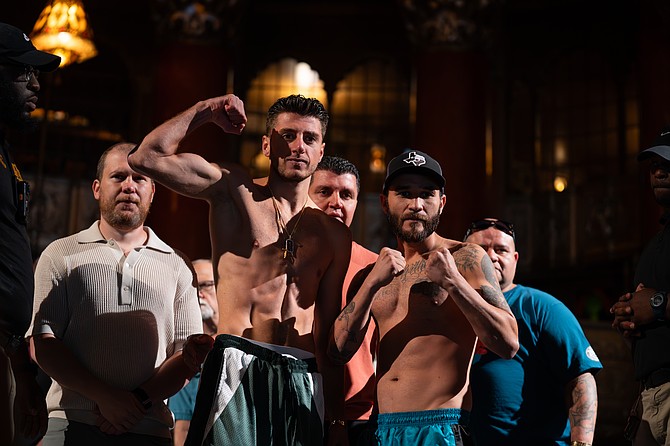Jonny Mansour (left) at yesterday's weigh-in