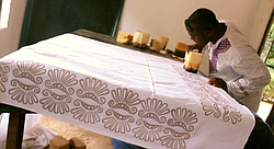 Traditional batik printmaking in a Dar es Salaam shop.