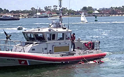 Man with injured arms pulled out by Coast Guard